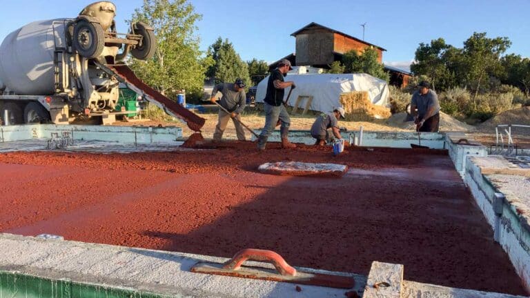 Straw bale home foundation being poured