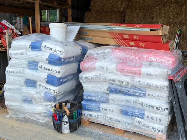 NHL Lime stacked in bags for use in straw bale construction