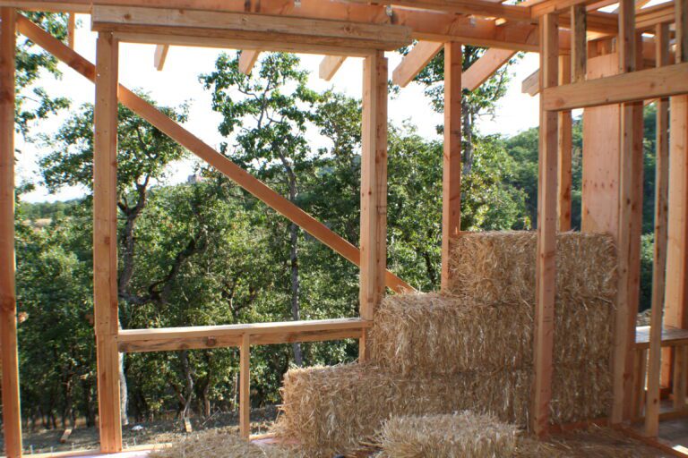 Example of a post and beam infill wall using strawbale construction