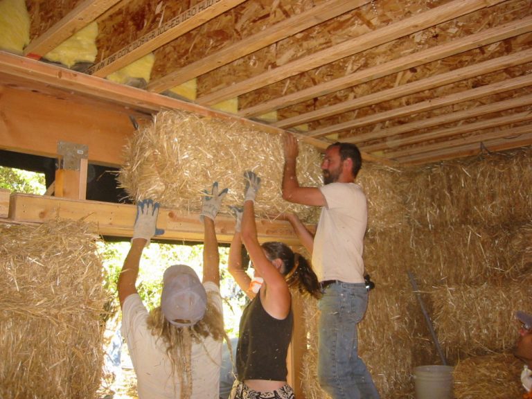 Installing bales in a straw bale house