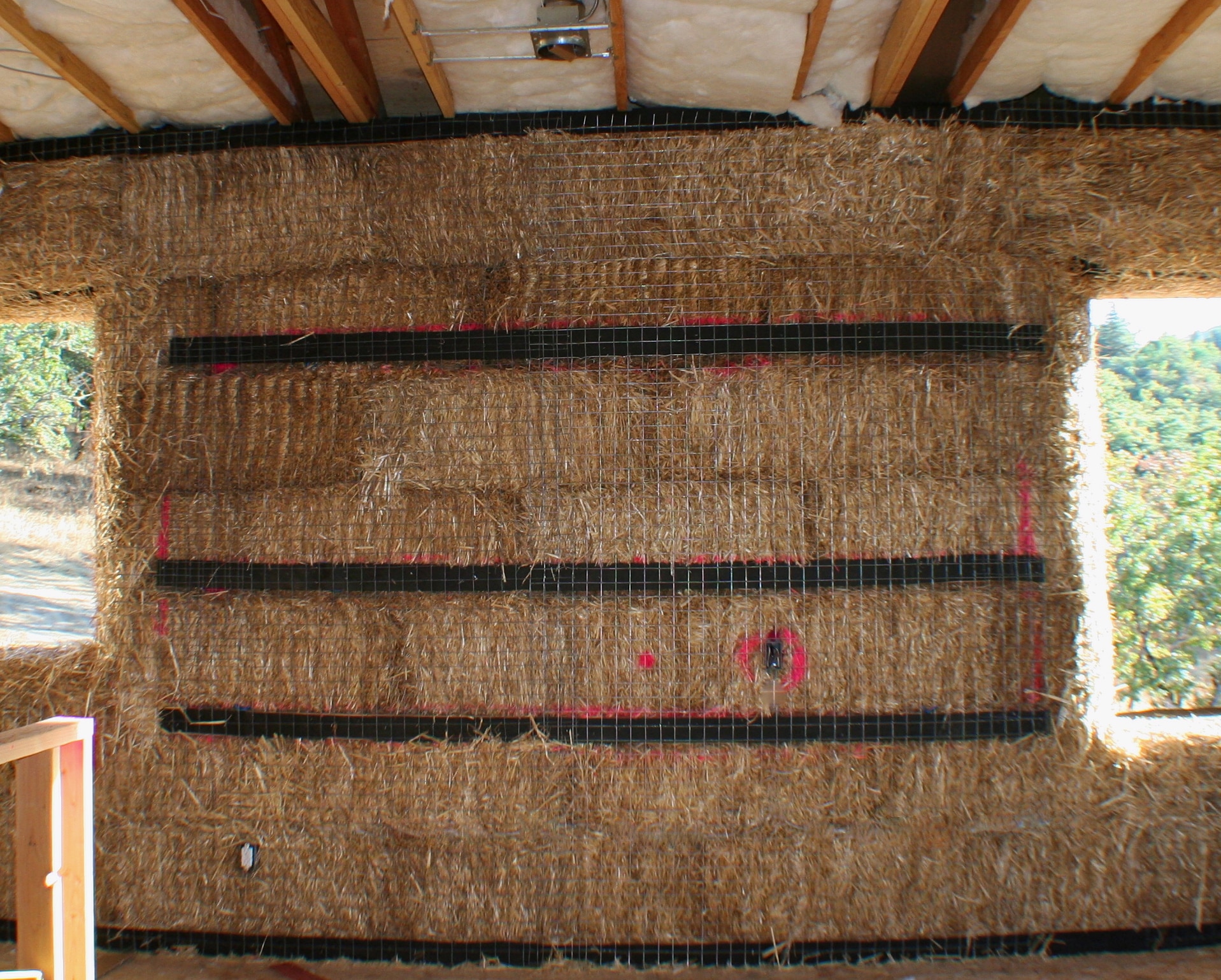 cabinet backing on straw bale wall with nailers