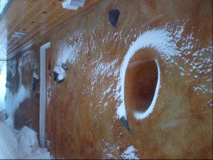 straw bale house with snow