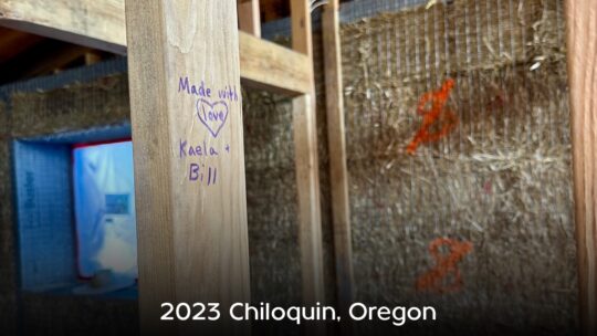 Strawbale home construction workshop, note left by participants on stud, "Made with Love"