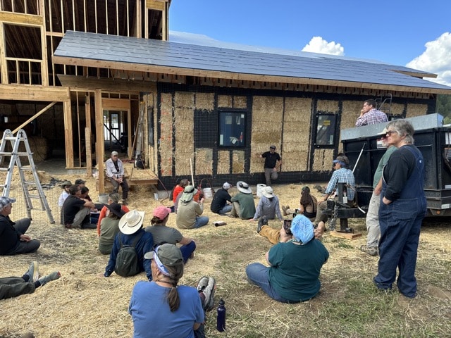 Timbo Scursso teaching cob at a straw bale workshop